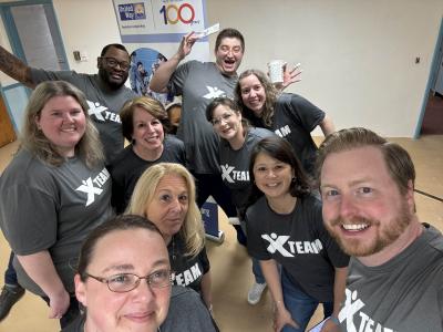 people in gray Berkshire Bank t-shirts