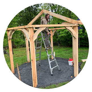 young man building a gazebo