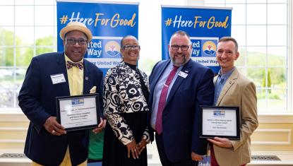 Award recipients Manny and Vannessa Guess Slaughter, BUW President and CEO Tom Bernard, and Alex Reczkowski